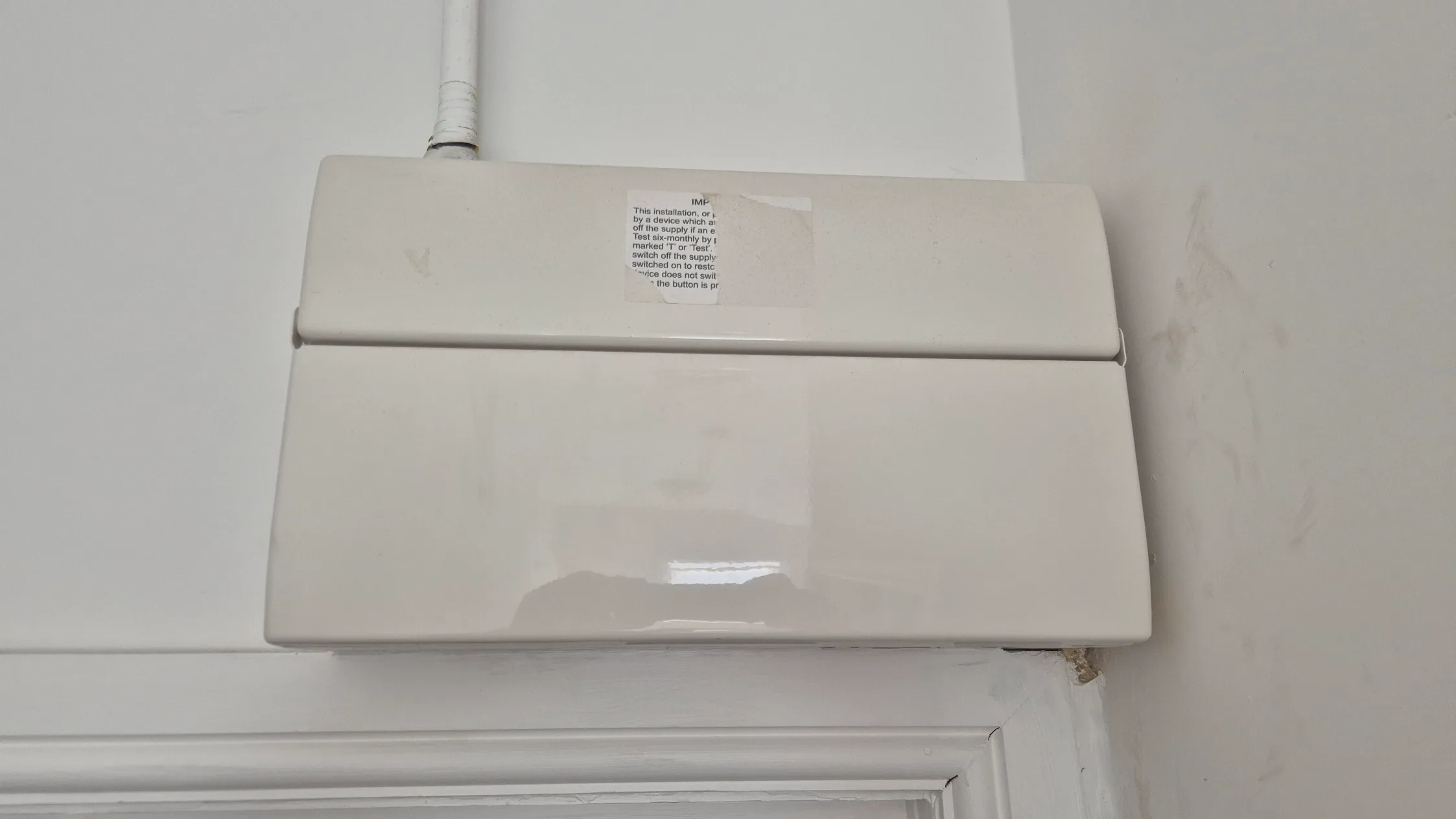 Existing consumer unit before replacement
